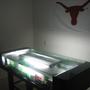 40 gallons freshwater fish tank (mostly fish and non-living decorations) - There are 2 22 gallon tanks built into a beer pong table. The table is fully sealed on the outside and there is ventilation underneath the table to provide air circulation for the tanks. Tanks are approx. 5'' x 8 x 10 each. There is an automated ball washer separate water source sealed and isolated for washing ping pong balls in play. Lighting is always brighter in tank than in room so fish dont seem to notice beer pong much. Tabletanks built from scratch.Heating1 - 100W HYDOR theo heater1 - 100W Marineland Visitherm StealthLighting4 - 20W Natural Light Fluorescent Bulbs stripalternatively,4 - 20W Black Light Bulbs StripFiltration4 - Fluval 2plus internal filters, live plants
