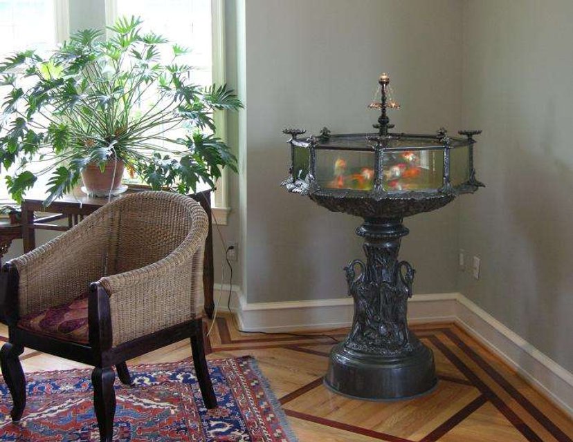 Rated #2421: 36 Gallons Freshwater Fish Tank - Victorian Style Aquarium, 36 gallon, with a brass & bronze central fountain

A hand made reproduction of an 1870's classic, which was one of the first American made aquariums.

57 inches tall X 38 inches wide