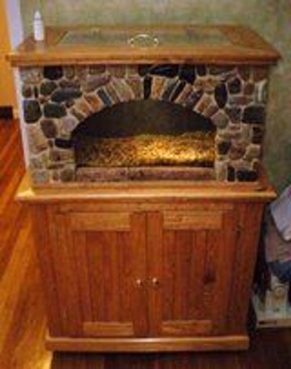 fish tank picture - stone housing for a 20 gallon fish tank with custom cabinet and top