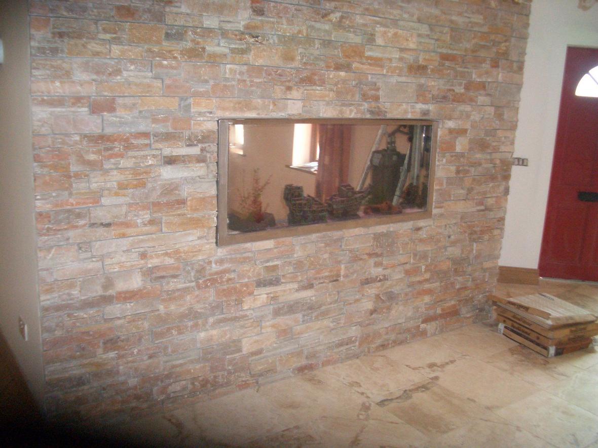 55 gallons freshwater fish tank (mostly fish and non-living decorations) - self build acrylic in wall tank, with 250 fluval filter, currently being stocked 55 gallon in size.